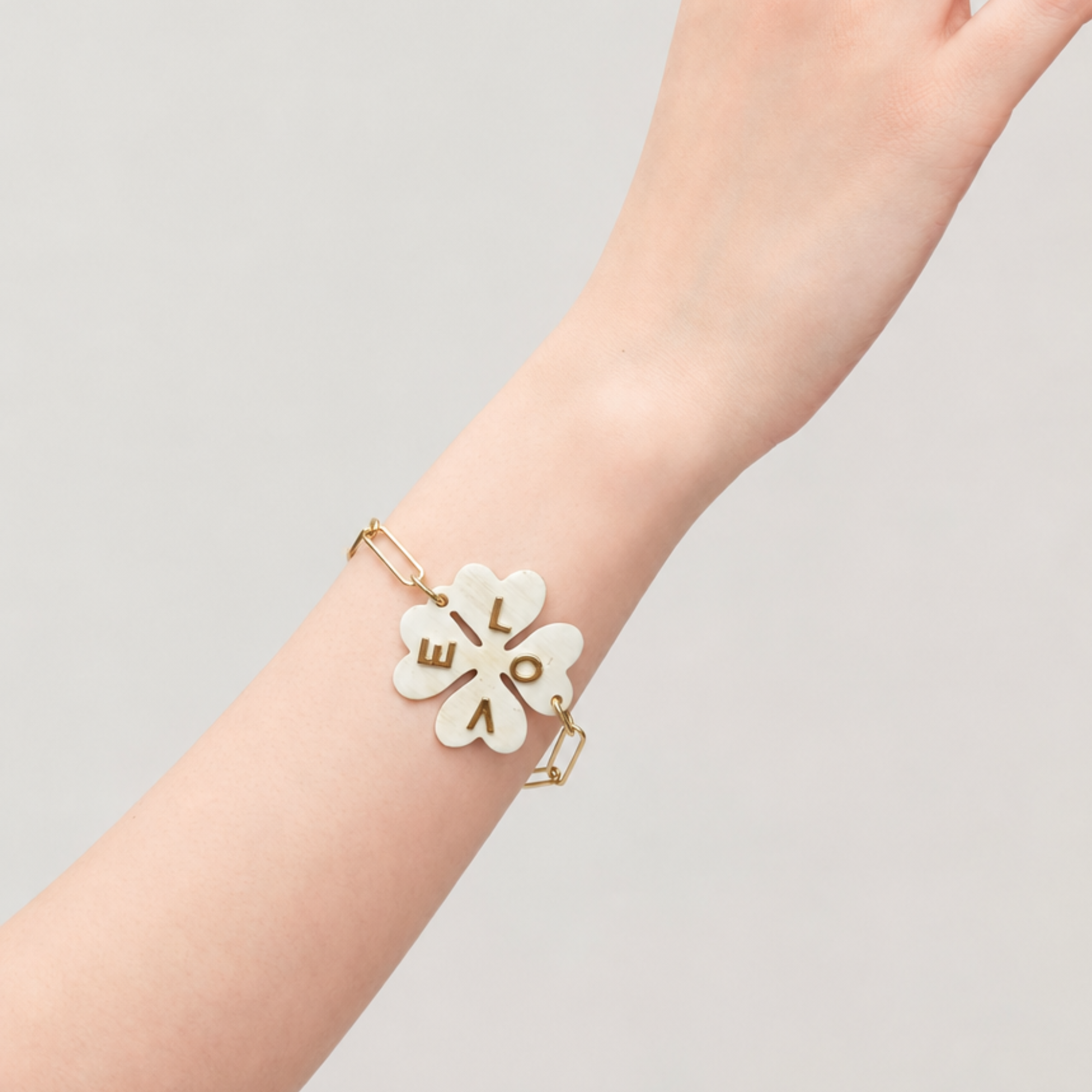 MLO LOVE clover bracelet styled on the wrist