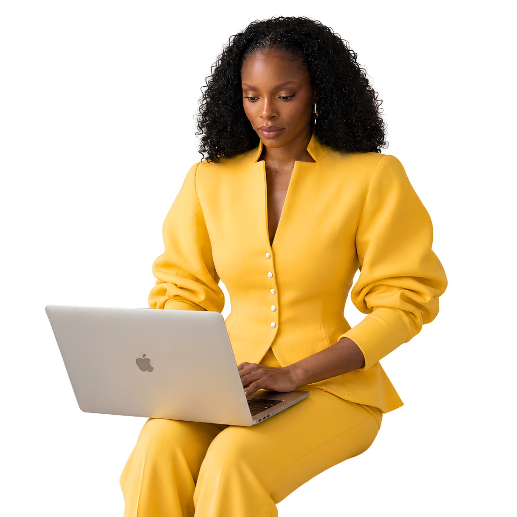 Abigail working on a laptop in a canary yellow suit